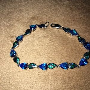LOVED AUTHENTIC LONDON BLUE TOPAZ STONES/BLUE FIRE OPAL STERLING SILVER BRACELET